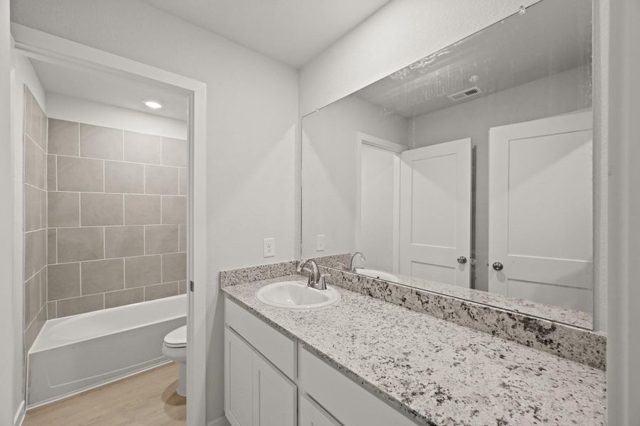 Furnished interior view inside a new home in Lonestar Collection at Paloma at Sanford Farms, Waller (Image 8).