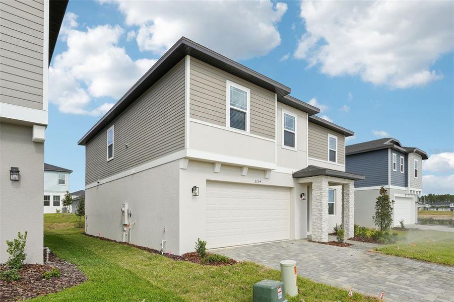 Exterior details and patio area of a home in Cyrene at Minneola, Minneola (Image 21). Exterior details and patio area of a home in Cyrene at Minneola, Minneola (Image 21).