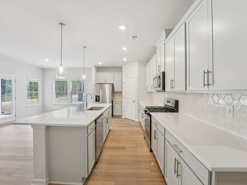 Furnished interior view inside a new home in Northwoods at Mirror Lake, Villa Rica (Image 8).