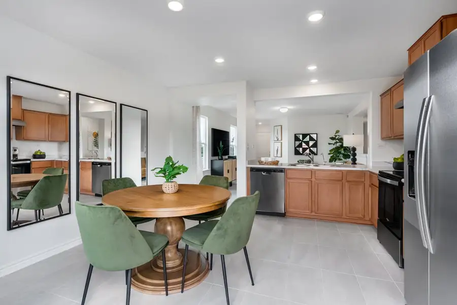 Representative furnished interior of a home built from the 1242 Modeled by KB Home in Spanish Trails, San Antonio (Image 6).
