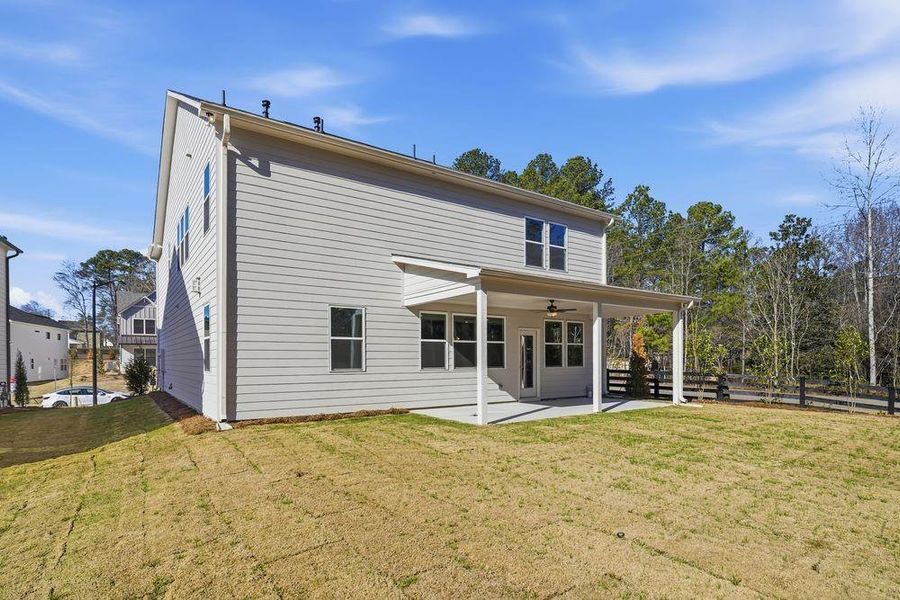 Exterior details and patio area of a home in Reserve at Hickory Walk, Kennesaw (Image 25).
