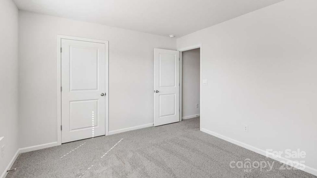 Spacious, unfurnished interior of a new home in Wallace Springs, Statesville (Image 15).