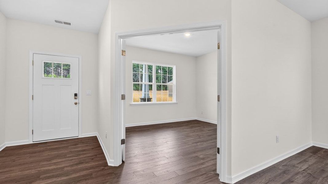 Spacious, unfurnished interior of a new home in Shahbain Reserve, Raeford (Image 15). Spacious, unfurnished interior of a new home in Shahbain Reserve, Raeford (Image 15).