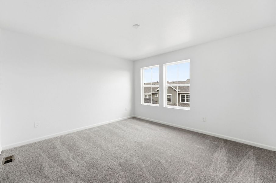 Spacious, unfurnished interior of a new home in Trailstone Townhomes - The Westerly Collection, Arvada (Image 13).
