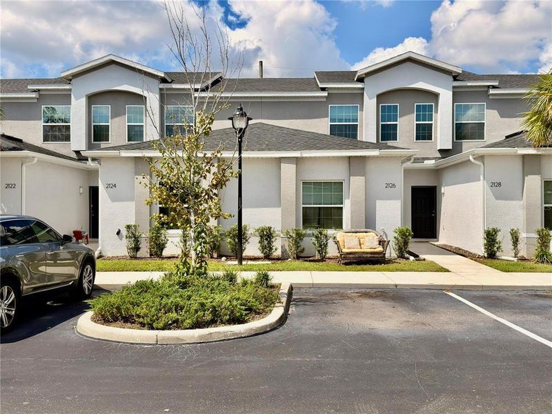 Front exterior of a new home in , Kissimmee, FL, highlighting curb appeal (Image 21). Front exterior of a new home in , Kissimmee, FL, highlighting curb appeal (Image 21).