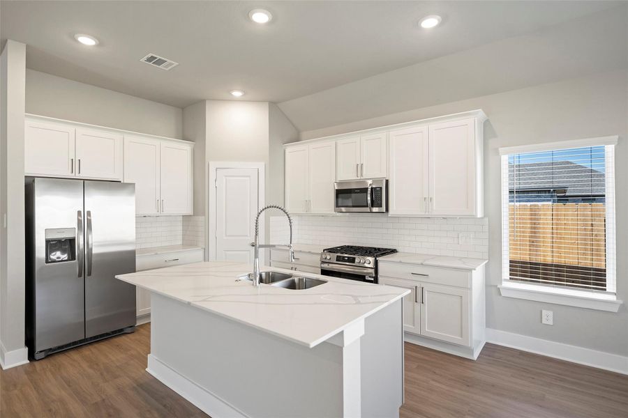 Expansive island serves as a natural gathering spot for family and friends.