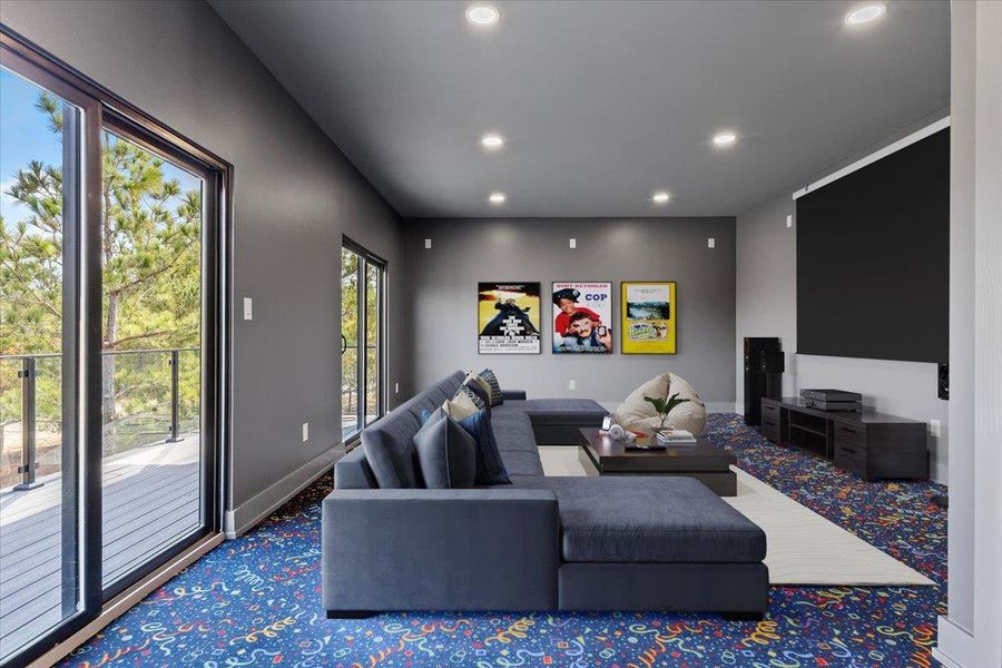 Media/ game room, deck, with half bath. Media/ game room, deck, with half bath.