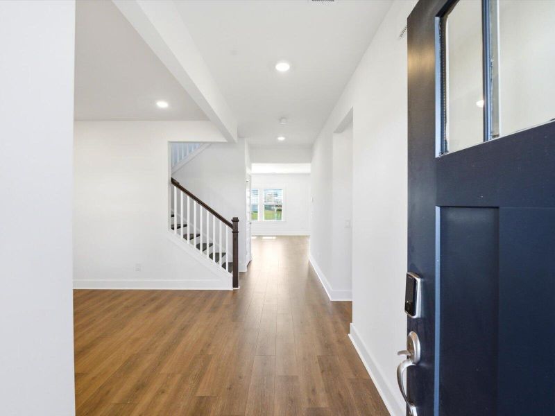 Spacious, unfurnished interior of a new home in The Coves at Lakes of Cane Bay II, Summerville (Image 18). Spacious, unfurnished interior of a new home in The Coves at Lakes of Cane Bay II, Summerville (Image 18).