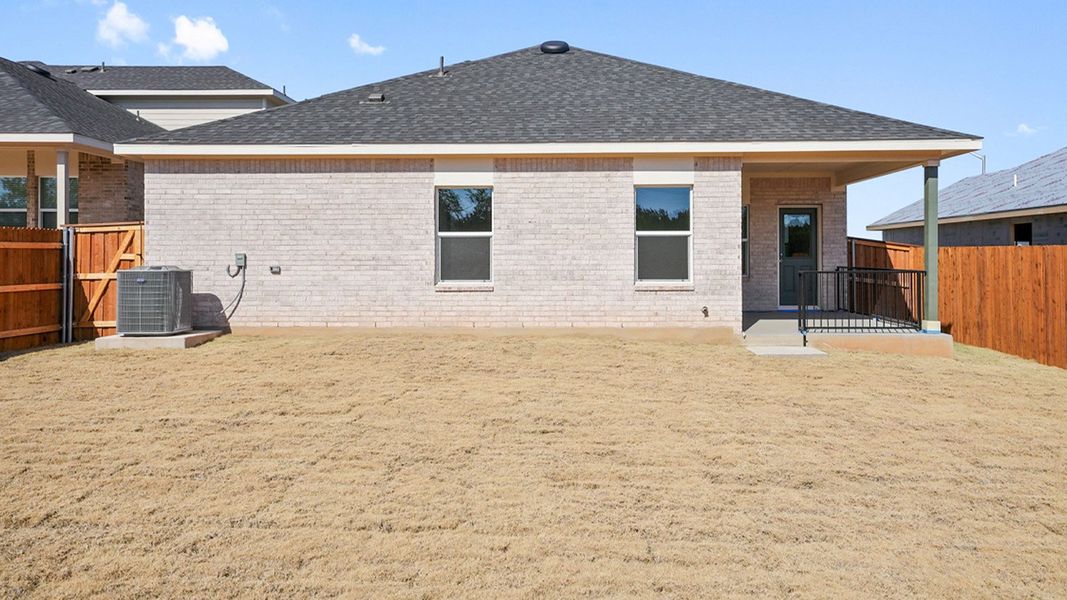 Exterior details and patio area of a home in Thunder Rock, Marble Falls (Image 21).