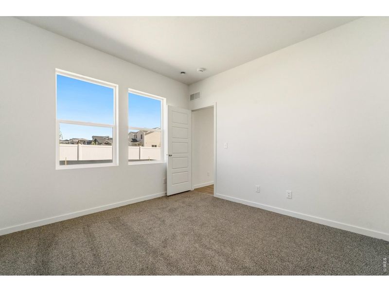 Spacious, unfurnished interior of a new home in Liberty Draw, Evans (Image 10).