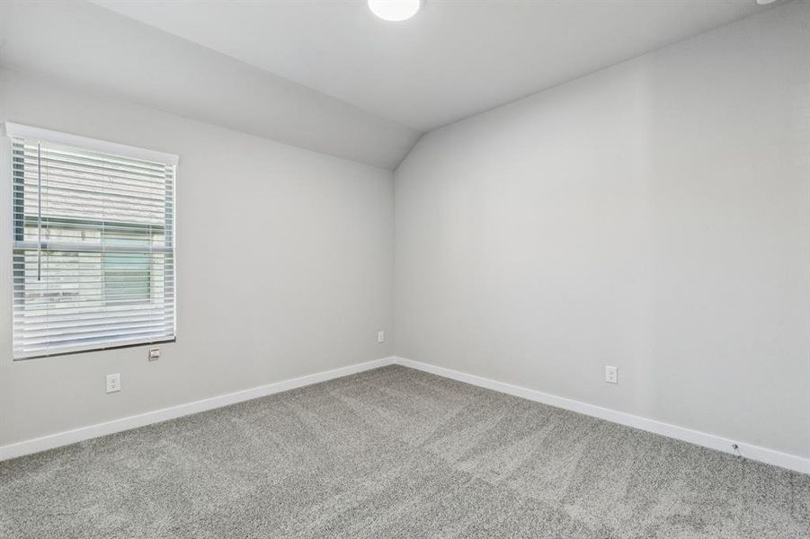 Bedroom in the Heisman home plan by Trophy Signature Homes – REPRESENTATIVE PHOTO Bedroom in the Heisman home plan by Trophy Signature Homes – REPRESENTATIVE PHOTO