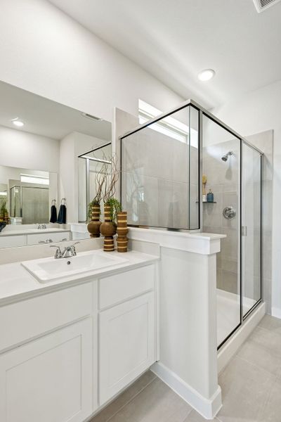 Primary Bathroom in a Nicholson Ranch Magnolia Model Home in Lavon TX by Trophy Signature Homes