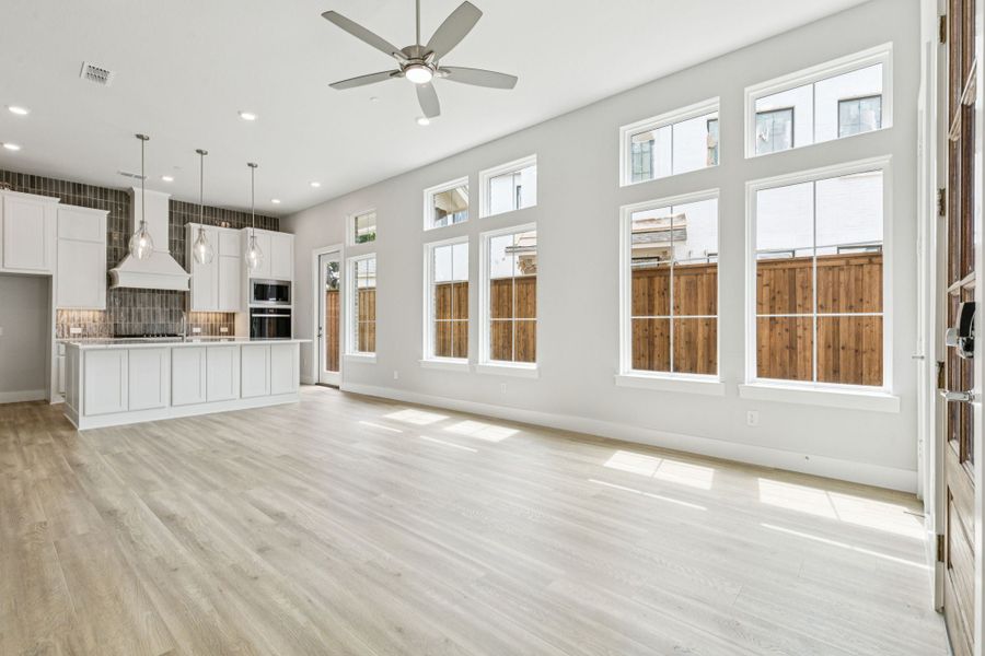 Representative unfurnished interior of a home built from the Hamilton by Centre Living Homes in Newman Village Townhomes, Frisco (Image 19).