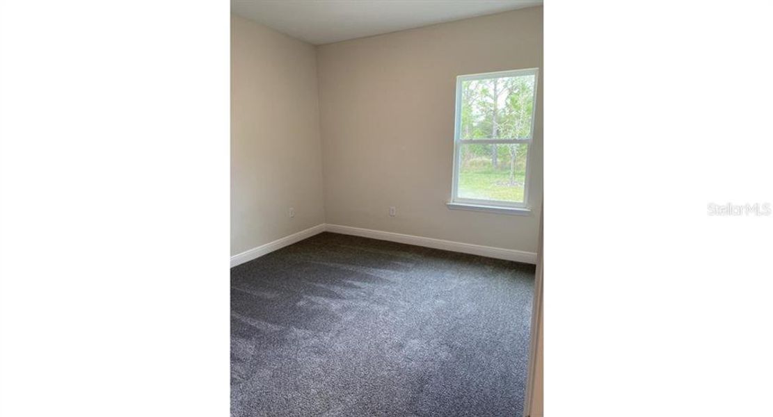 Spacious, unfurnished interior of a new home in , North Port (Image 13).
