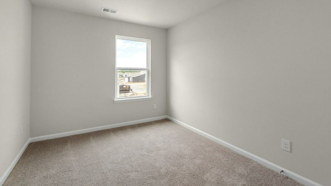 Representative unfurnished interior of a home built from the PEARSON TOWNHOME by D.R. Horton in Grayson Park Townhomes, Leland (Image 22).