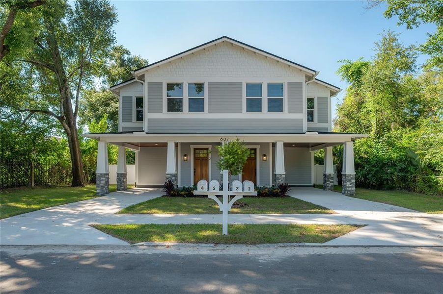 Front exterior of a new home in , Tampa, FL, highlighting curb appeal (Image 1). Front exterior of a new home in , Tampa, FL, highlighting curb appeal (Image 1).