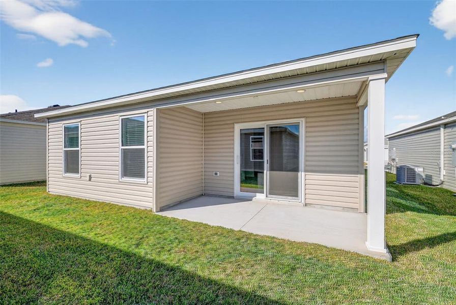 Exterior details and patio area of a home in , The Villages (Image 20).