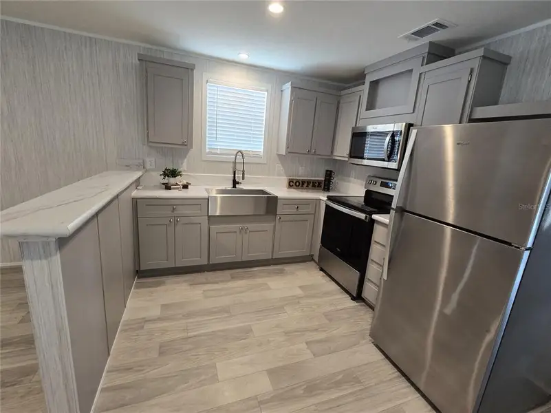 Furnished interior view inside a new home in , Englewood (Image 4).