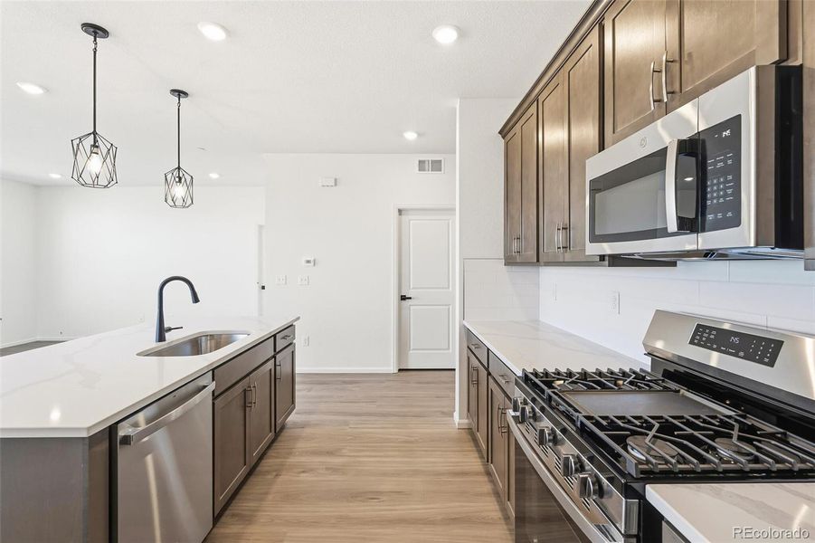Furnished interior view inside a new home in The Nest Classic at Canyon Creek, Erie (Image 9).