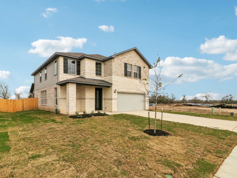 Front exterior of a new home in Royal Crest, San Antonio, TX, highlighting curb appeal (Image 20).