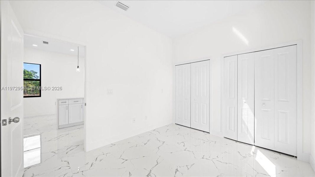 Spacious, unfurnished interior of a new home in , Lehigh Acres (Image 17).