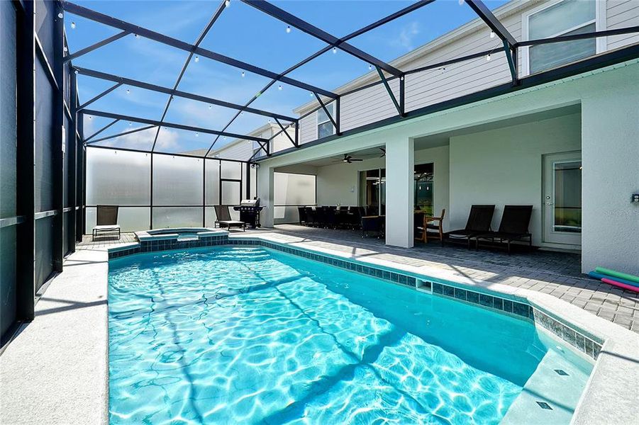 Exterior details and patio area of a home in Windsor Island Resort, Davenport (Image 23).