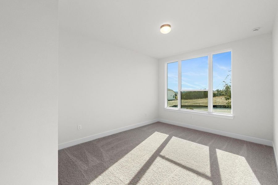 Spacious, unfurnished interior of a new home in Lariat, Liberty Hill (Image 43).