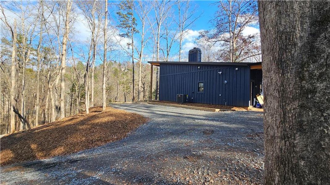 Exterior details and patio area of a home in , Ellijay (Image 3).
