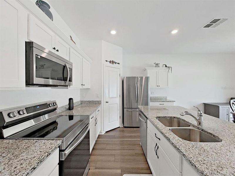 Furnished interior view inside a new home in Clinton Corner, Dade City (Image 9).
