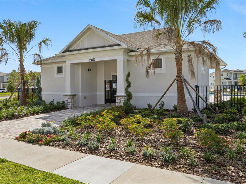 Front exterior of a new home in Osprey Ranch, Winter Garden, FL, highlighting curb appeal (Image 26).