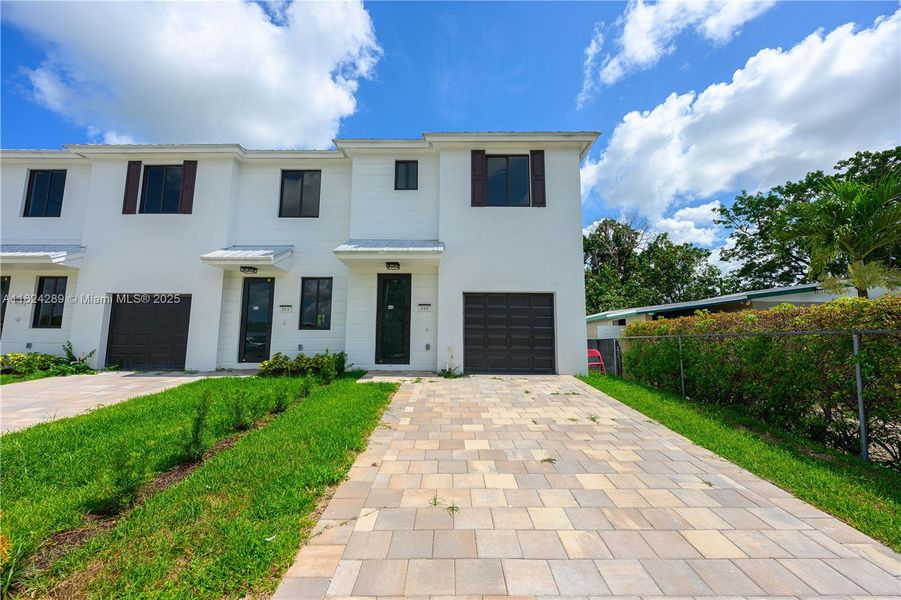Front exterior of a new home in , Florida City, FL, highlighting curb appeal (Image 17).