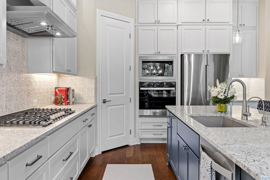 The walk-in pantry provides excellent storage for everyday organization. The walk-in pantry provides excellent storage for everyday organization.