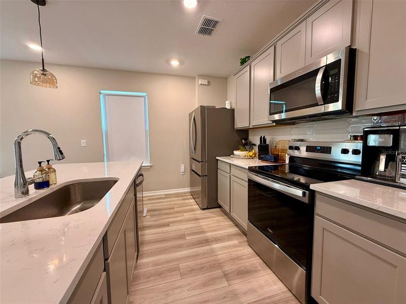 Furnished interior view inside a new home in , Winter Garden (Image 4).