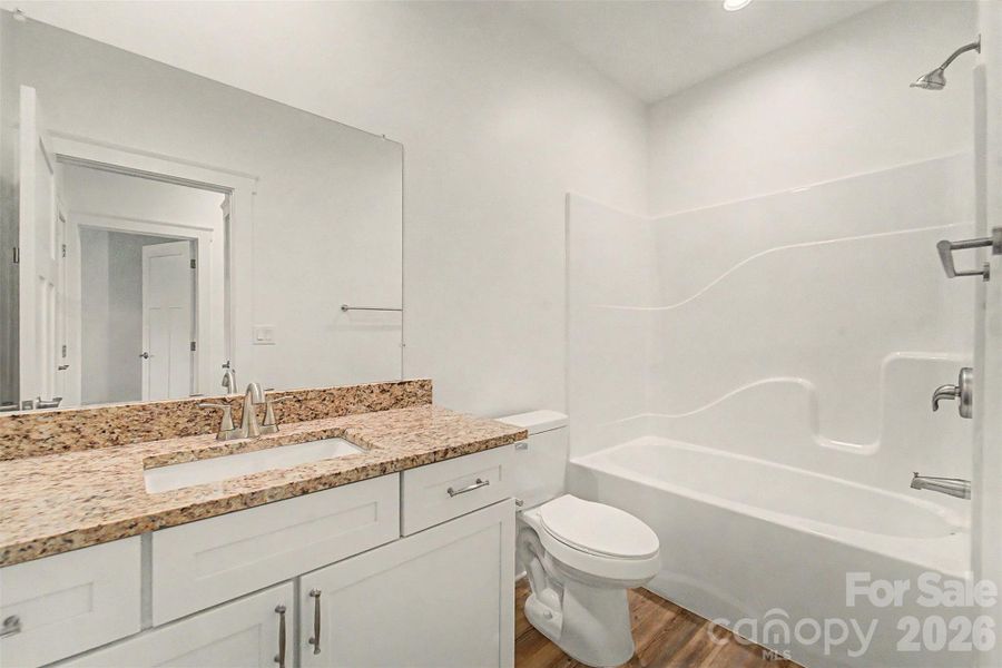 Furnished interior view inside a new home in , Waynesville (Image 4).