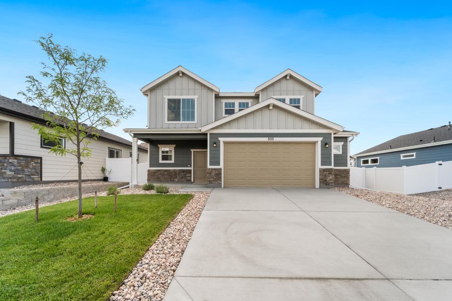 Front exterior of a new home in Union Colony West, Greeley, CO, highlighting curb appeal (Image 2). Front exterior of a new home in Union Colony West, Greeley, CO, highlighting curb appeal (Image 2).