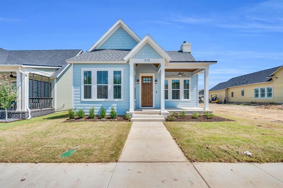 Front exterior of a new home in , Midlothian, TX, highlighting curb appeal (Image 17).