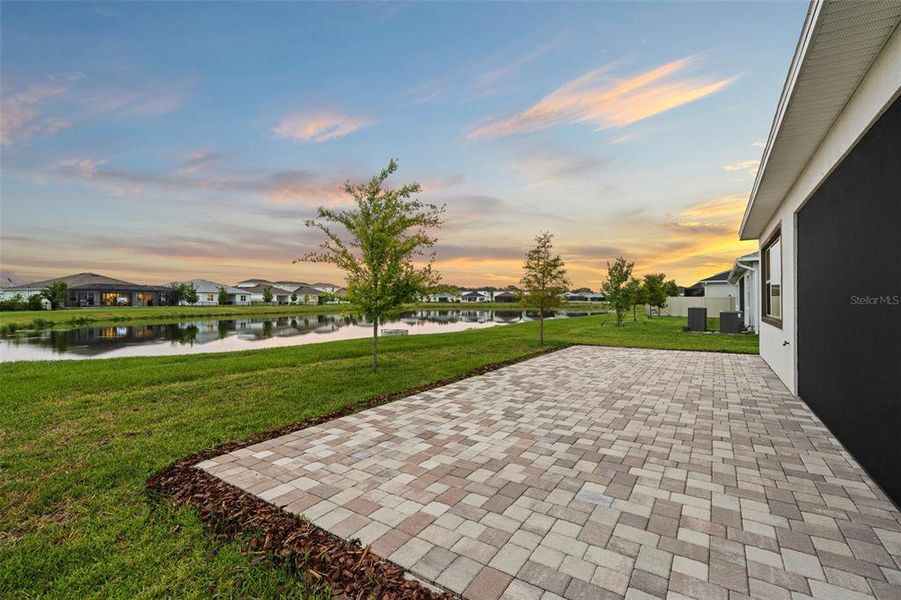 Exterior details and patio area of a home in Robin's Cove at Epperson, Wesley Chapel (Image 27).