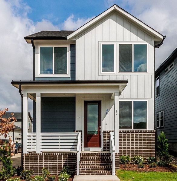 Representative exterior details of a home built from the The Brockway by David Weekley Homes in NoVi Chatham Park - The Mews Collection, Pittsboro (Image 4). Representative exterior details of a home built from the The Brockway by David Weekley Homes in NoVi Chatham Park - The Mews Collection, Pittsboro (Image 4).