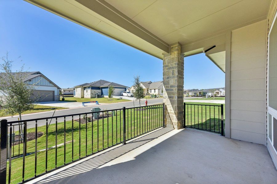 Covered porch with a residential view