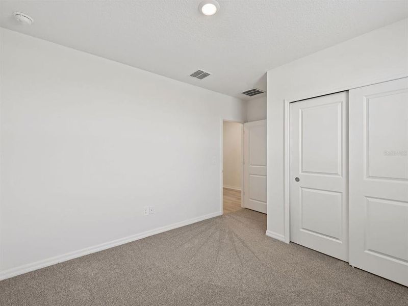 Spacious, unfurnished interior of a new home in The Reserve at Van Oaks, Auburndale (Image 20).