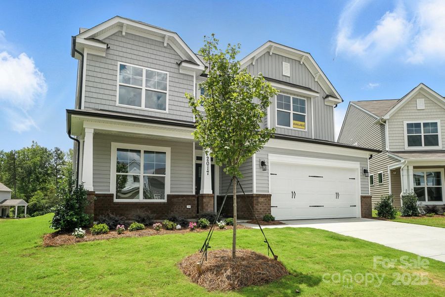 Front exterior of a new home in Hampton Woods, Charlotte, NC, highlighting curb appeal (Image 2).