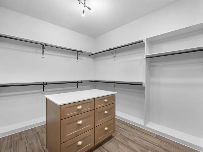 Ready to go shopping? Primary closet features tons of space and a secret storage compartment