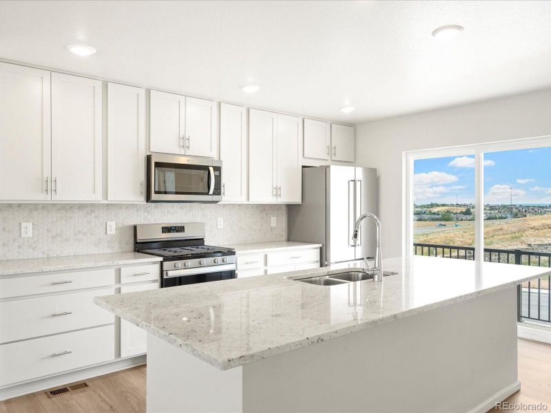 Furnished interior view inside a new home in Three Hills, Morrison (Image 11).