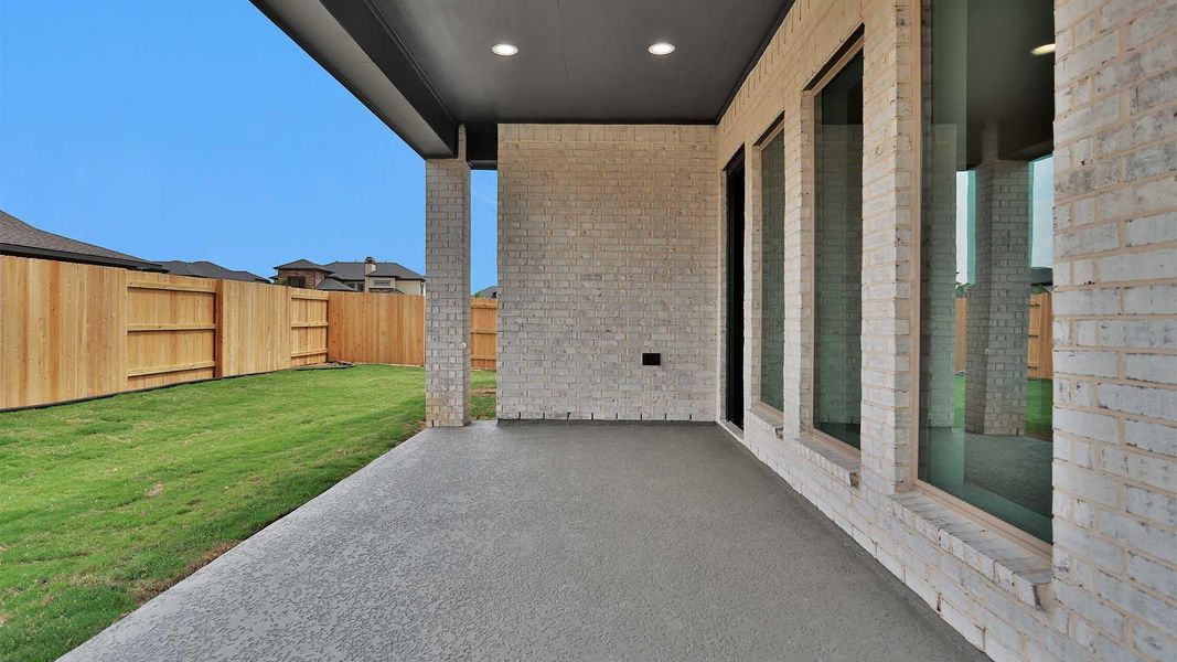 Exterior details and patio area of a home in Elyson, Katy (Image 3). Exterior details and patio area of a home in Elyson, Katy (Image 3).