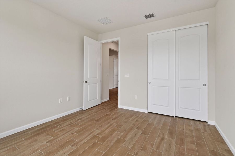 Spacious, unfurnished interior of a new home in Del Webb Tradition, Port St. Lucie (Image 56).