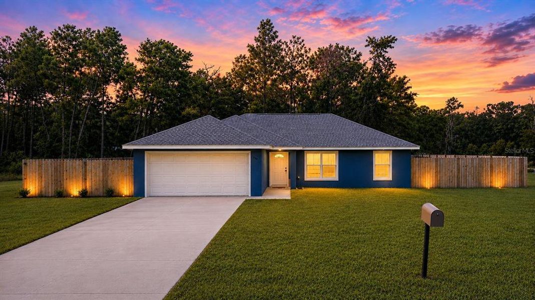 Front exterior of a new home in , Ocklawaha, FL, highlighting curb appeal (Image 22).
