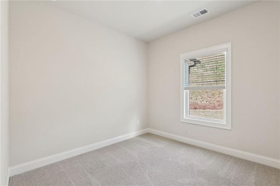 Spacious, unfurnished interior of a new home in Hemingway - Reserve Series, Cumming (Image 36).