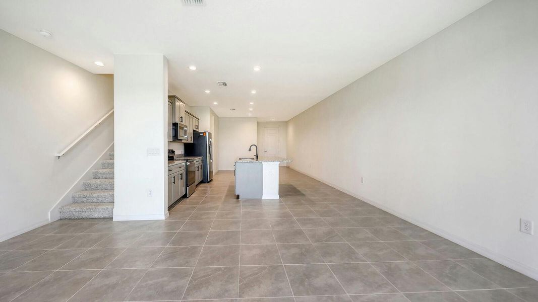 Spacious, unfurnished interior of a new home in Palm Grove Real Estate and Homes for Sale in Lakewood Ranch, FL - Neal Communities, Lakewood Ranch (Image 56).