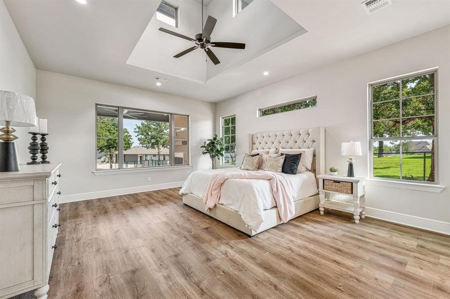 Bedroom featuring light hardwood / wood-style flooring and ceiling fan