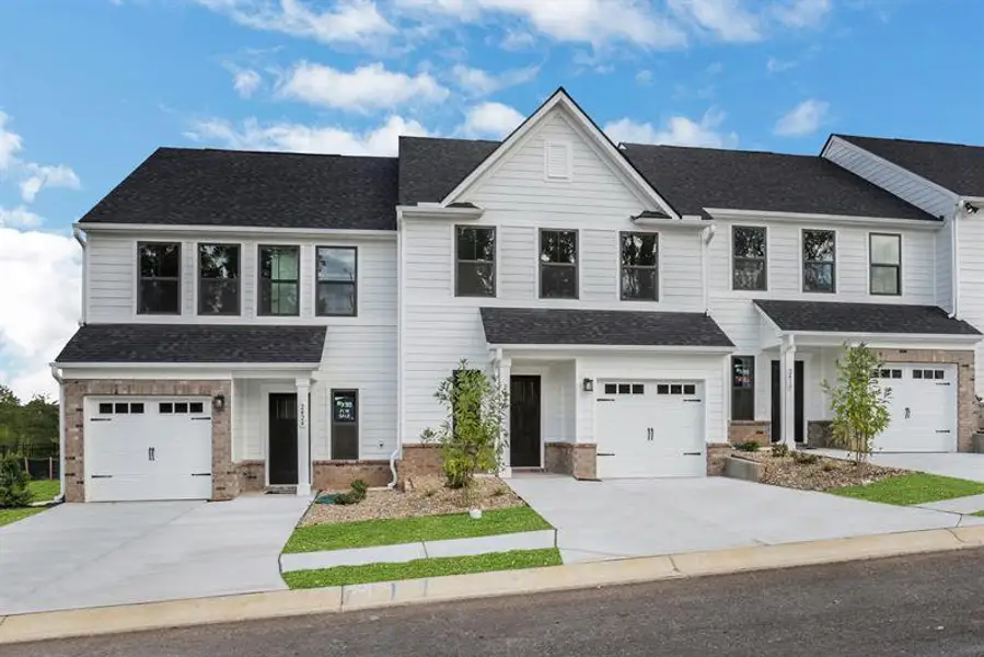 Front exterior of a new home in Laurel Fields, Gainesville, GA, highlighting curb appeal (Image 2).